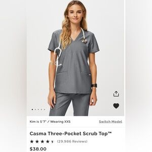 Casma three-pocket scrub top. Color: graphite Size: M